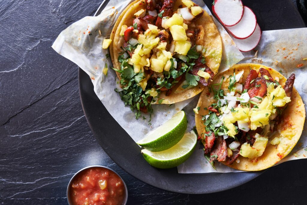 two mexican street tacos close up shot from above